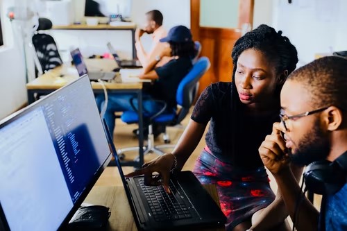 two people on a computer looking at the UK's research and development tax credits regime